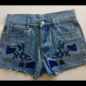 Denim cutoffs with rose embroidery
